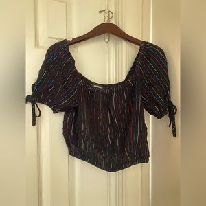 Black pinstriped rainbow tinsel crop top